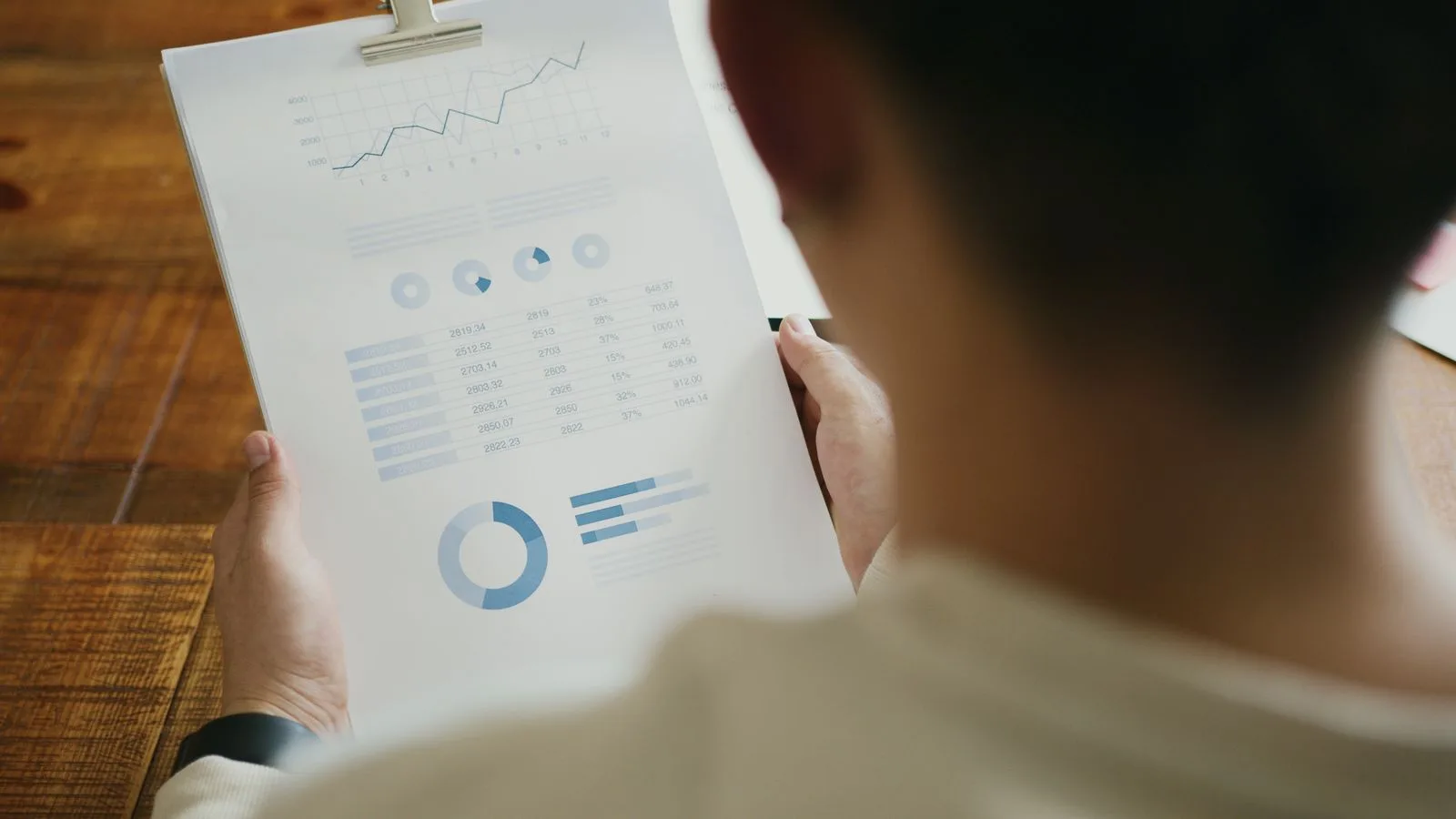 Recruiter reviewing hiring metrics and candidate ghosting statistics