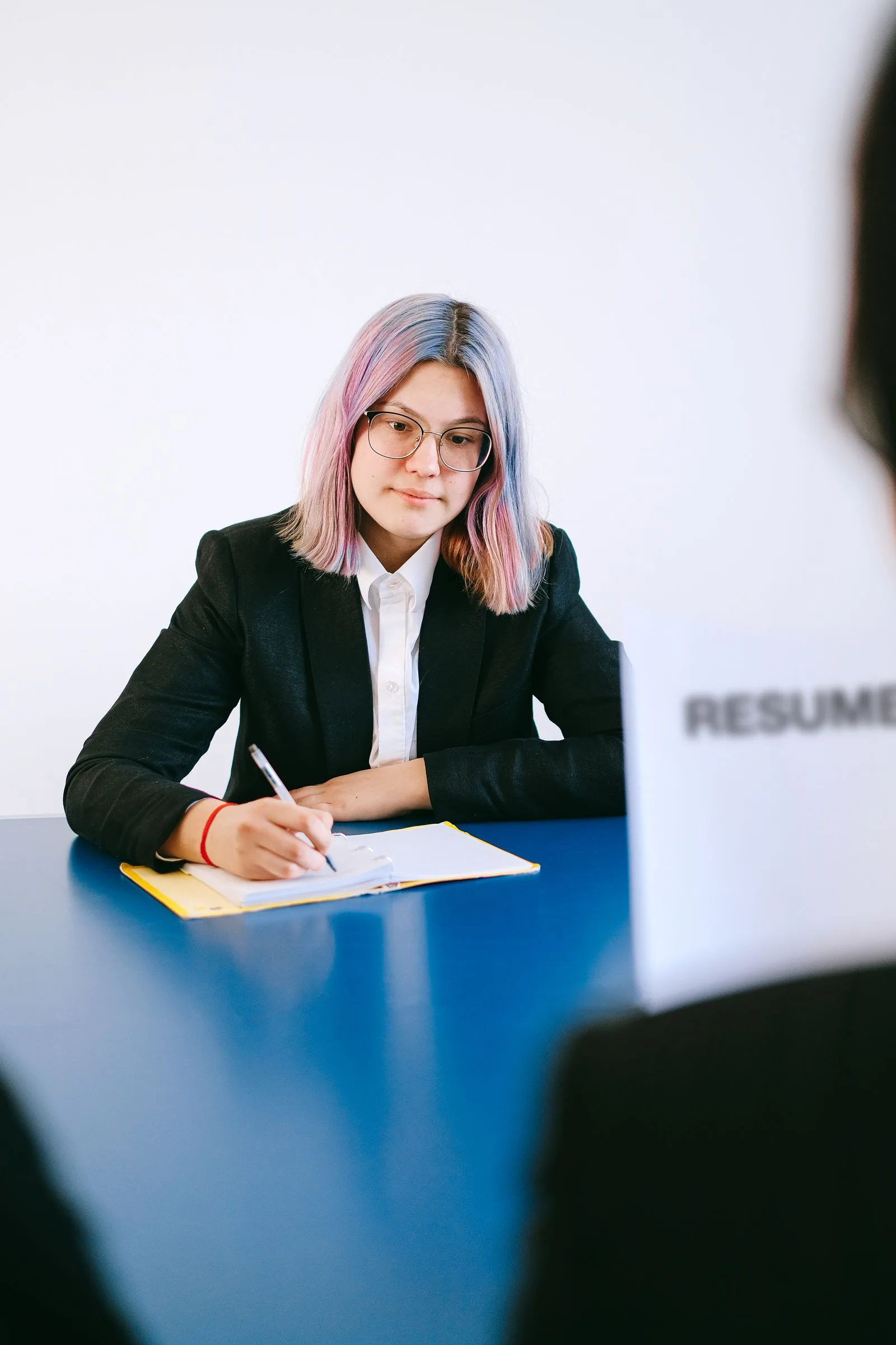 Recruiter carefully screening and evaluating candidate applications