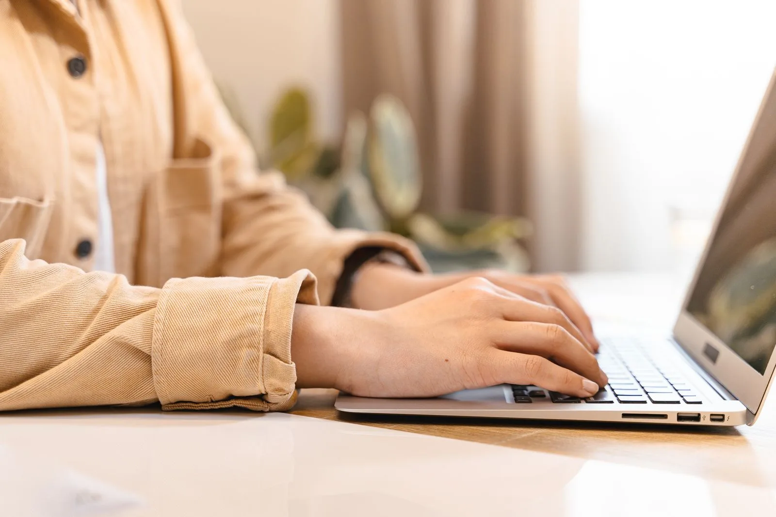 Professional working productively on laptop computer
